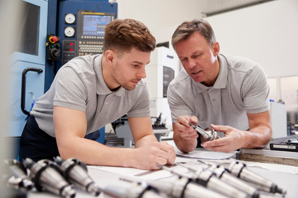 engineers looking at parts